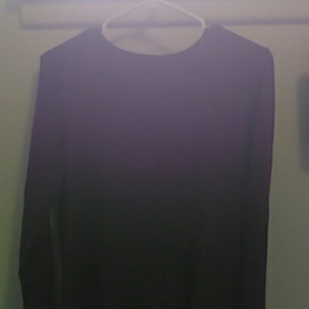 Plain purple-maroon tight shirt.